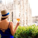 Woman with spritz aperol drink in Milan